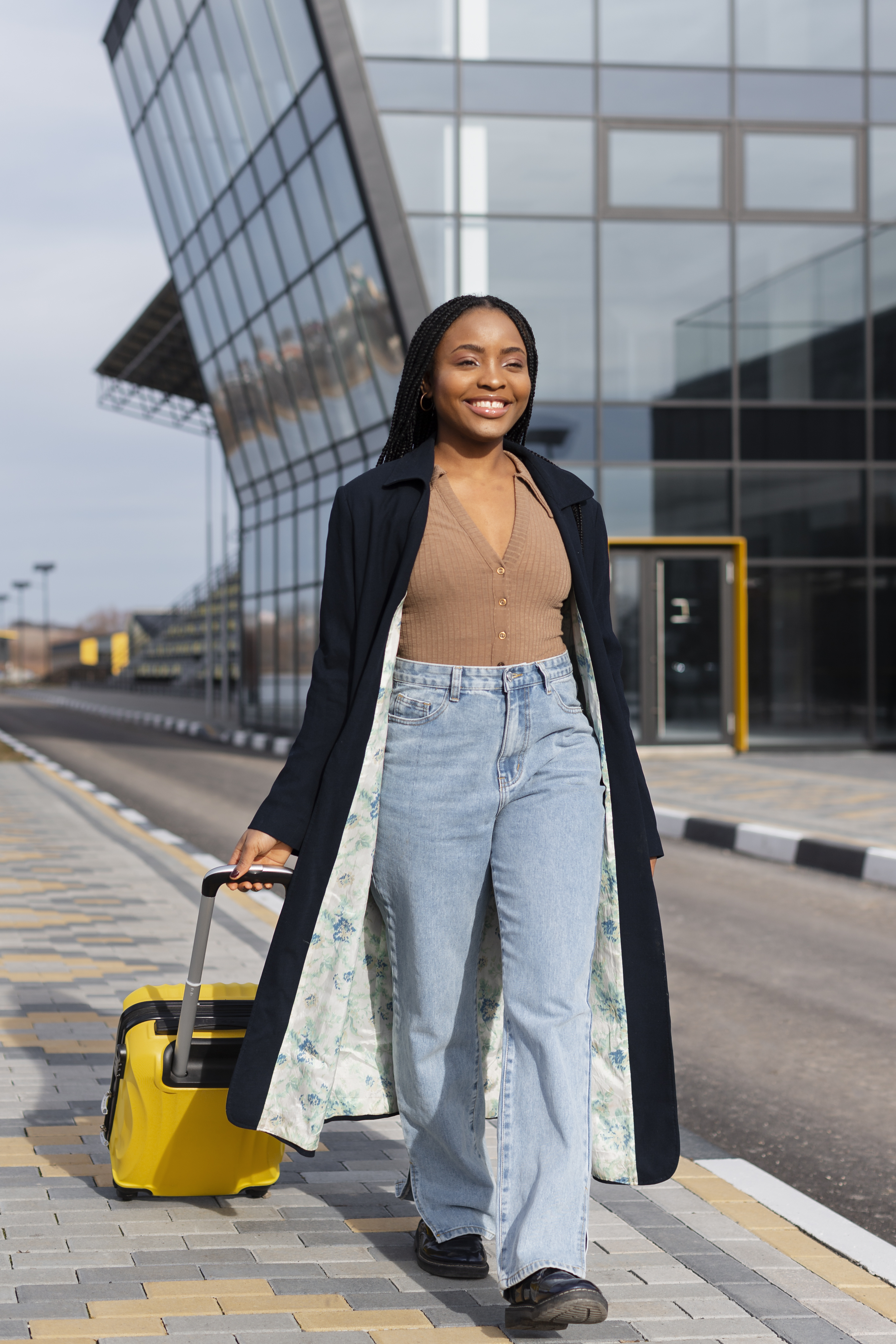 full-shot-smiley-woman-walking-with-baggage